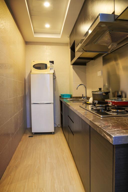 Fietser International Residence Shenzhen Zimmer foto