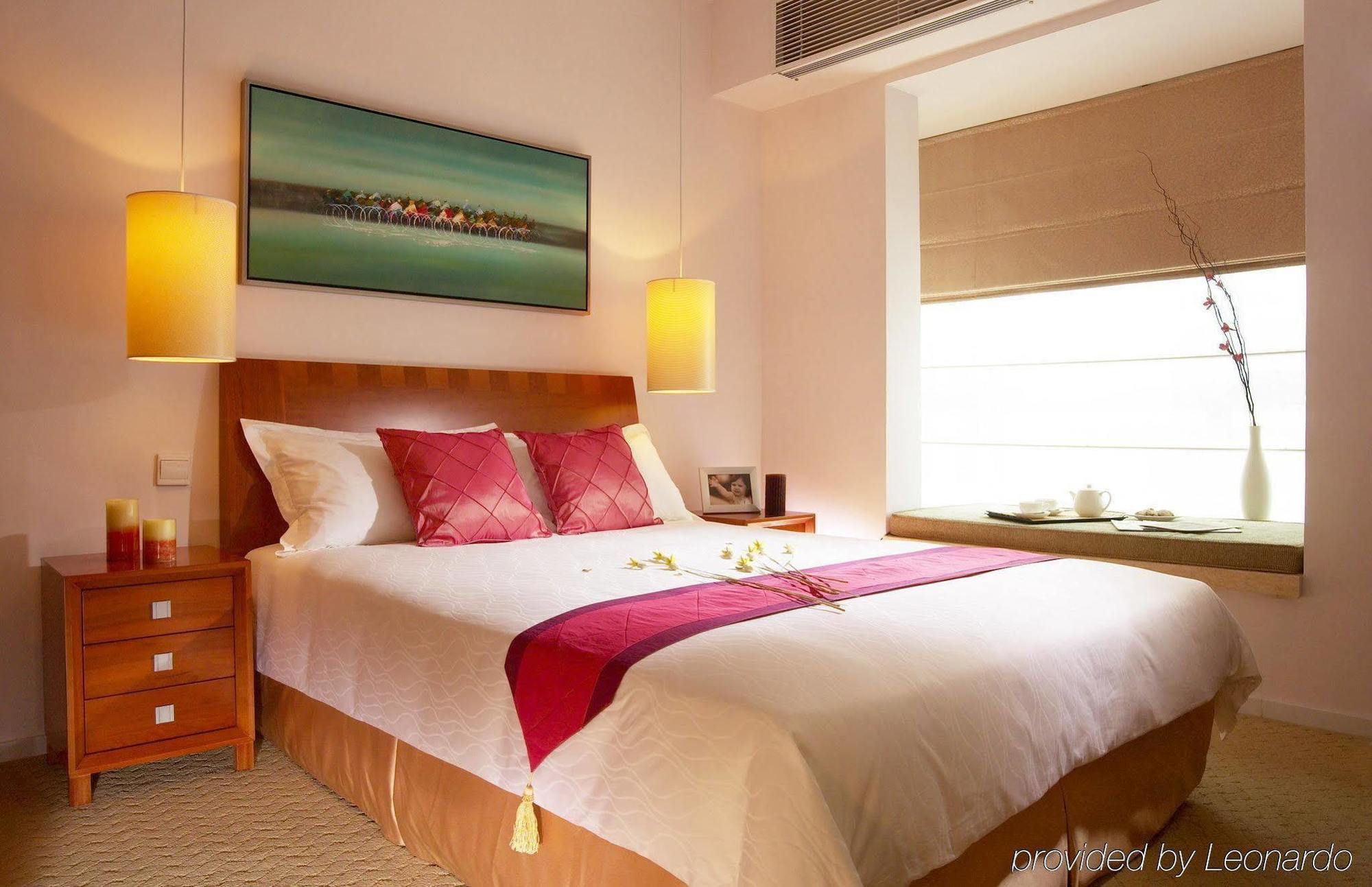 Fietser International Residence Shenzhen Zimmer foto